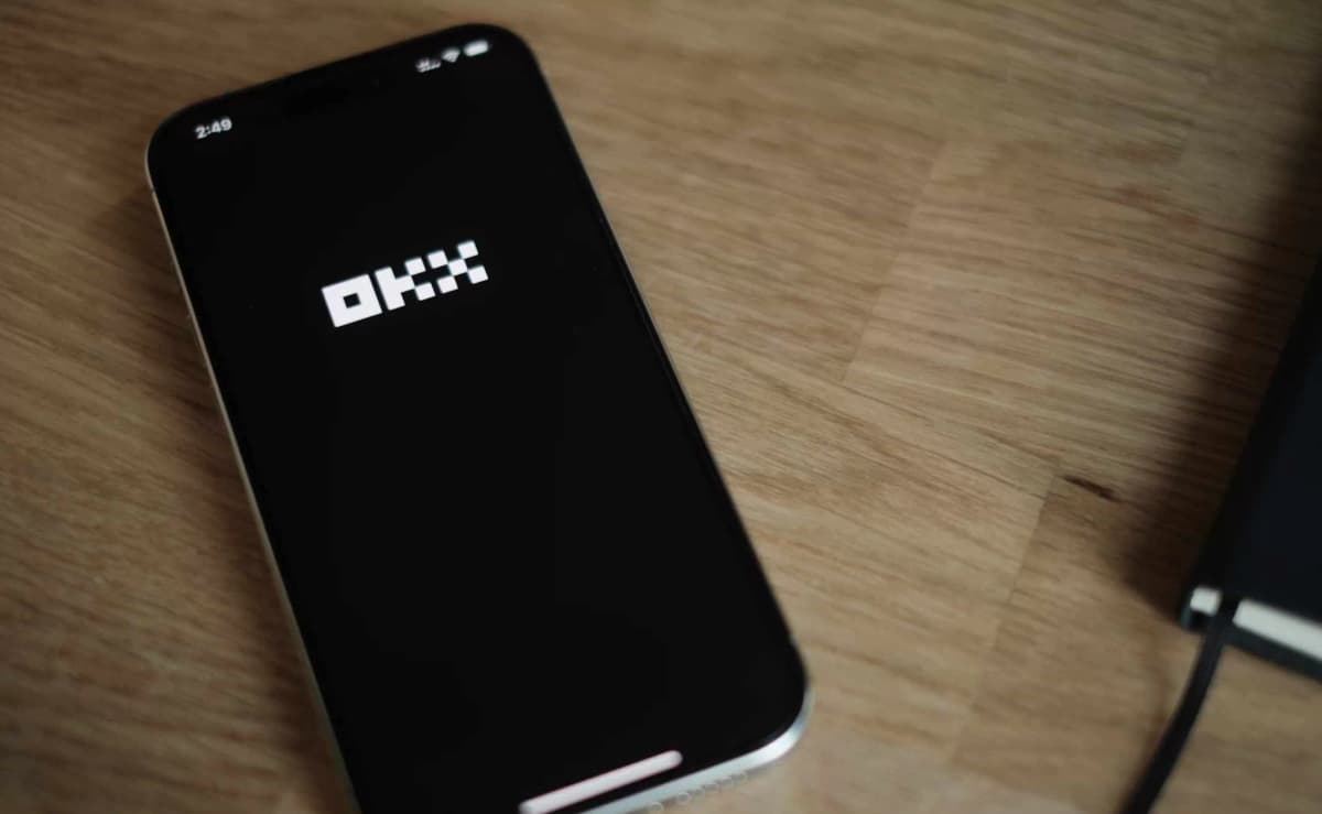 OKX logo on iphone screen